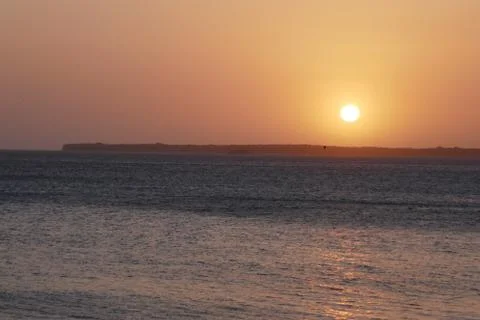 Sunset in the beach Stock Photos