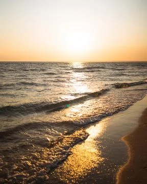 Sunset on the beach Stock Photos