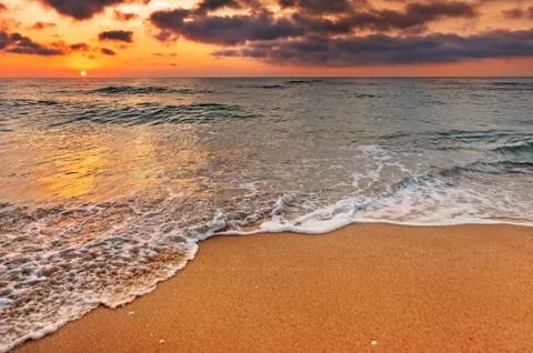 Sunset on the beach Stock Photos