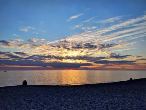 Sunset at the beach Stock Photos