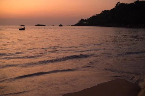 Sunset on the beach Stock Photos