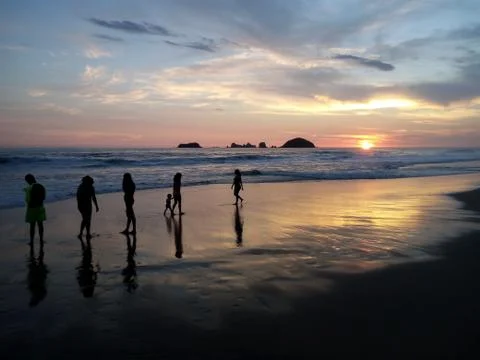 Sunset in the beach Stock Photos