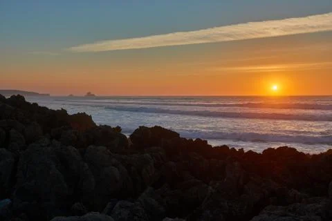 A sunset on the beach Stock Photos