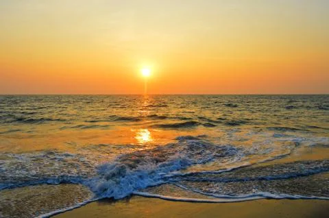 Sunset at the beach Stock Photos