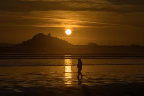 Sunset at the beach Stock Photos