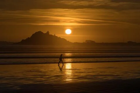 Sunset at the beach Stock Photos