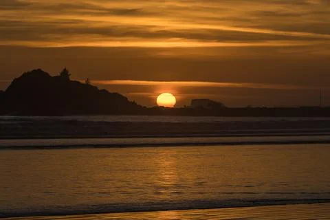 Sunset at the beach Stock Photos