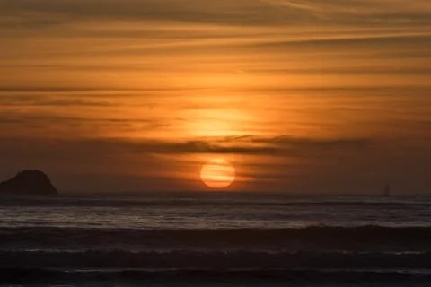 Sunset at the beach Stock Photos