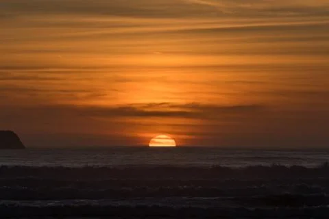 Sunset at the beach Stock Photos