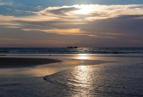 Sunset on the beach Stock Photos