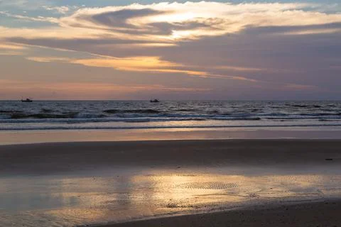 Sunset on the beach Stock Photos