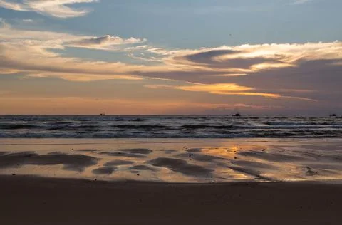 Sunset on the beach Stock Photos