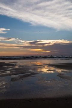 Sunset on the beach Stock Photos