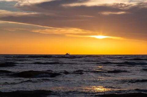 Sunset on the beach Stock Photos