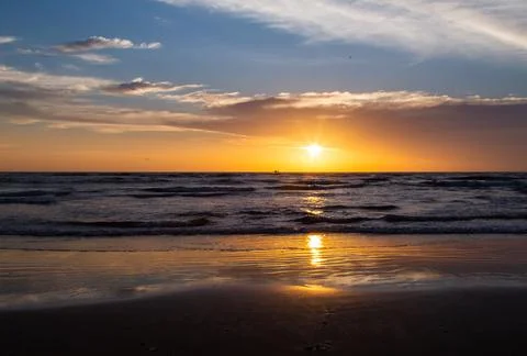 Sunset on the beach Stock Photos