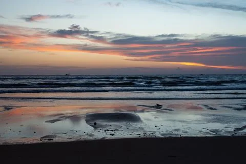 Sunset on the beach Stock Photos