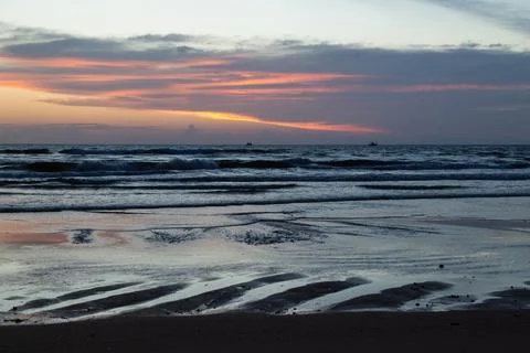 Sunset on the beach Stock Photos