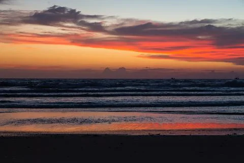 Sunset on the beach Stock Photos