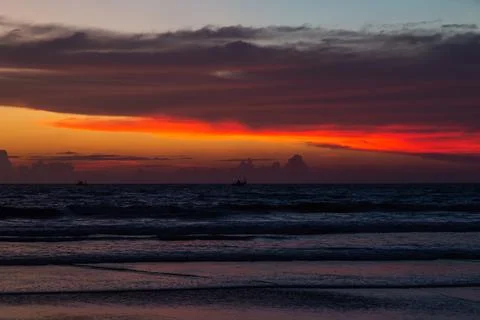 Sunset on the beach Stock Photos