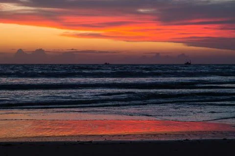 Sunset on the beach Stock Photos