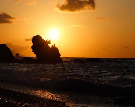 Sunset at the beach Stock Photos