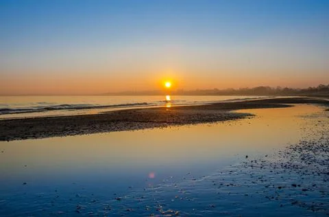Sunset beach Stock Photos