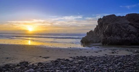 Sunset beach Stock Photos