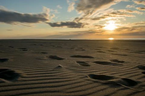 Sunset on the beach Stock Photos