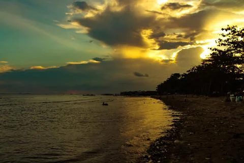 At sunset on the beach Stock Photos