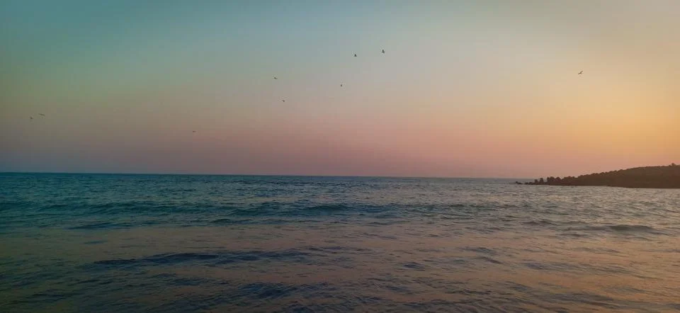 Sunset at the beach Stock Photos