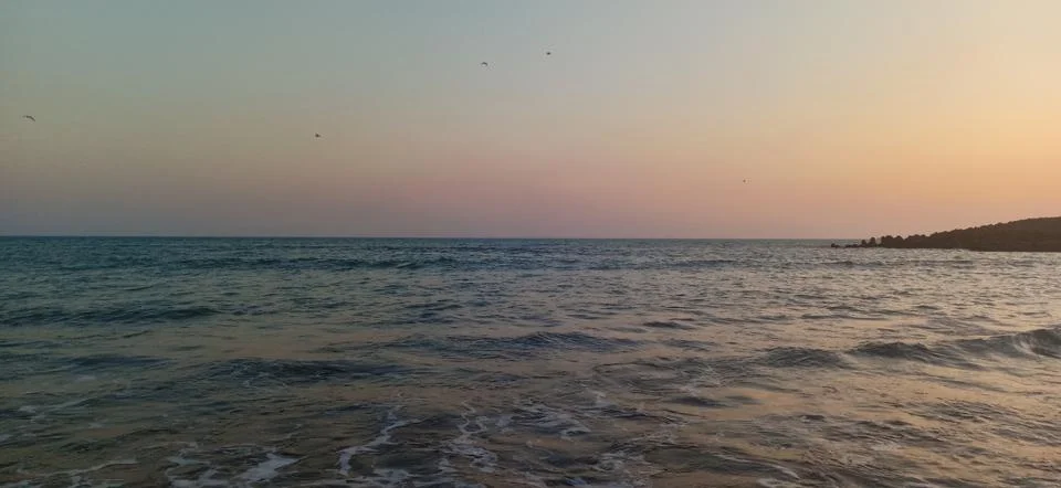 Sunset at the beach Stock Photos