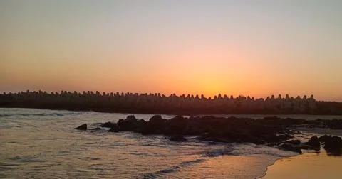 Sunset at the beach Stock Photos