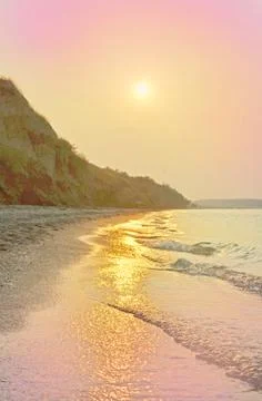 Sunset on the beach Stock Photos