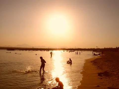 Sunset on the beach Stock Photos