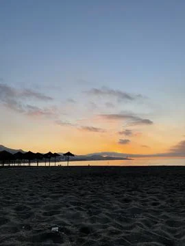 Sunset on the beach Stock Photos