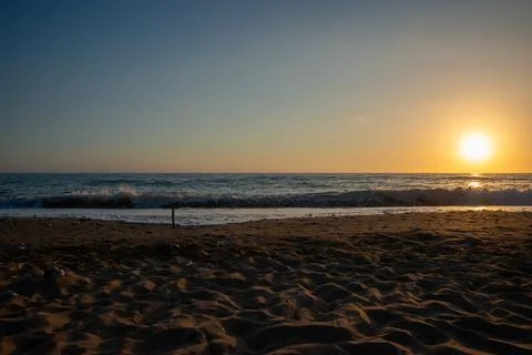 Sunset at the beach Stock Photos