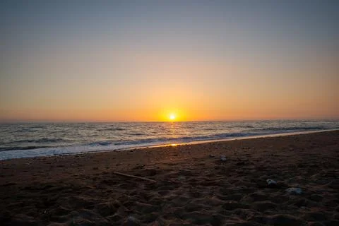 Sunset at the beach Stock Photos
