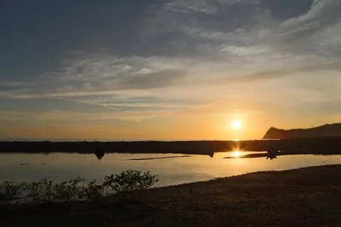 Sunset on the beach Stock Photos