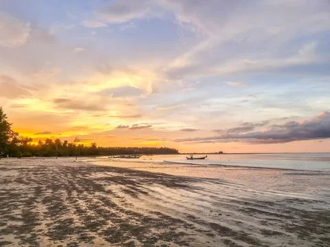 A sunset on a beach Stock Photos