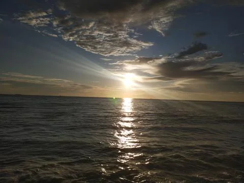 Sunset on the beach Stock Photos