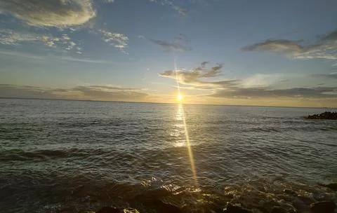 Sunset on the beach Stock Photos