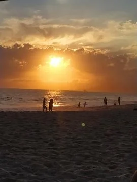 Sunset at the beach Stock Photos