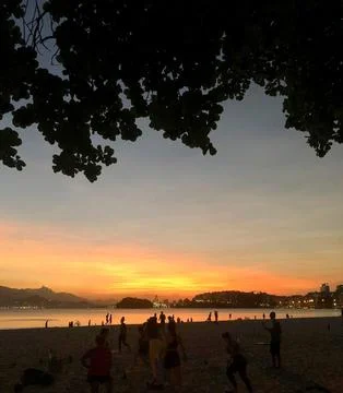 A sunset on the beach Фото