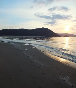 Sunset on the beach Stock Photos