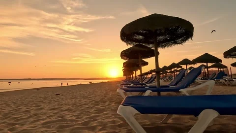 Sunset on the beach in Portugal Stock Footage 263851532