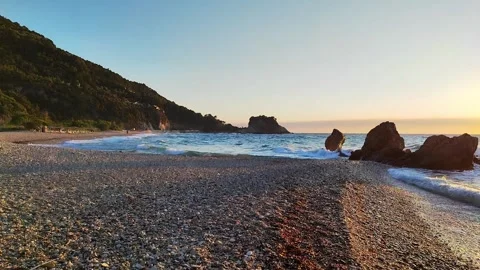 The sunset at the beach Potami in Samos island, Greece Vidéo 332611762