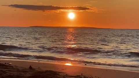 Sunset on beach relaxing Stock Footage 153876398