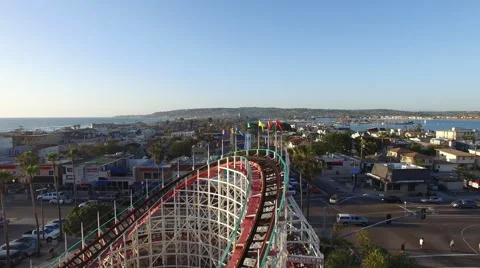 Sunset Beach Rollercoaster Drone Flyover Stock Footage 62390463