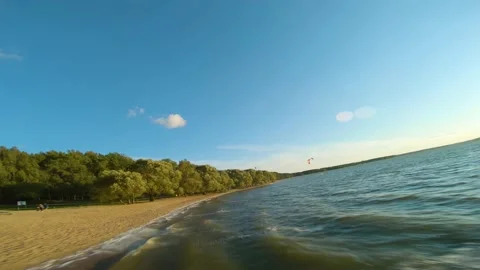 Sunset, beach, sand, wind, waves, water, sea, autumn, evening, sky, drone flight Video stock 160893679