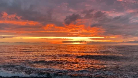 Sunset on beach, sea view with waves Video stock 218439904